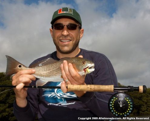 Man With Redfish Caught in 2009